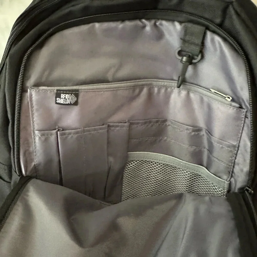Black Backpack with 3 compartments for stuff NWOT 12x17x4